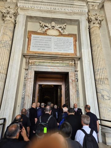 Preparing to walk through the Holy Doors at St. Peter Basilica