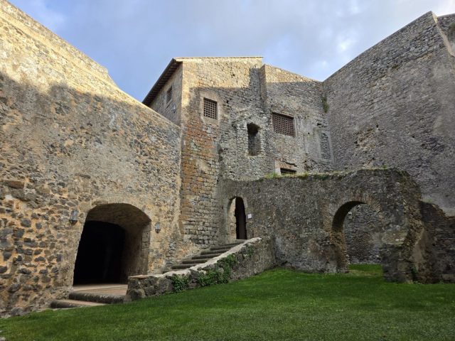 A courtyard with Bracciano Castle