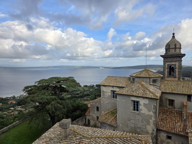 View from atop Bracciano Castle - looking out on Lake Bracciano. Only sailing or canoes are permitted; no motorized boats.