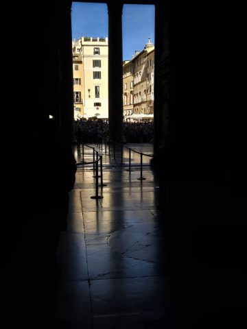 The throngs of people waiting outside for Mass to end and for the Basilica to again open to visitors.