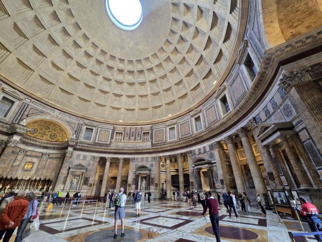 The main space of the Pantheon is the grand rotunda, a massive circular hall with a diameter of approximately 43.3 meters (142 feet). The dome of the rotunda soars high above, reaching an apex at the center, where the oculus, a circular opening with a diameter of about 8.8 meters (29 feet), allows a stream of light to pour into the temple.